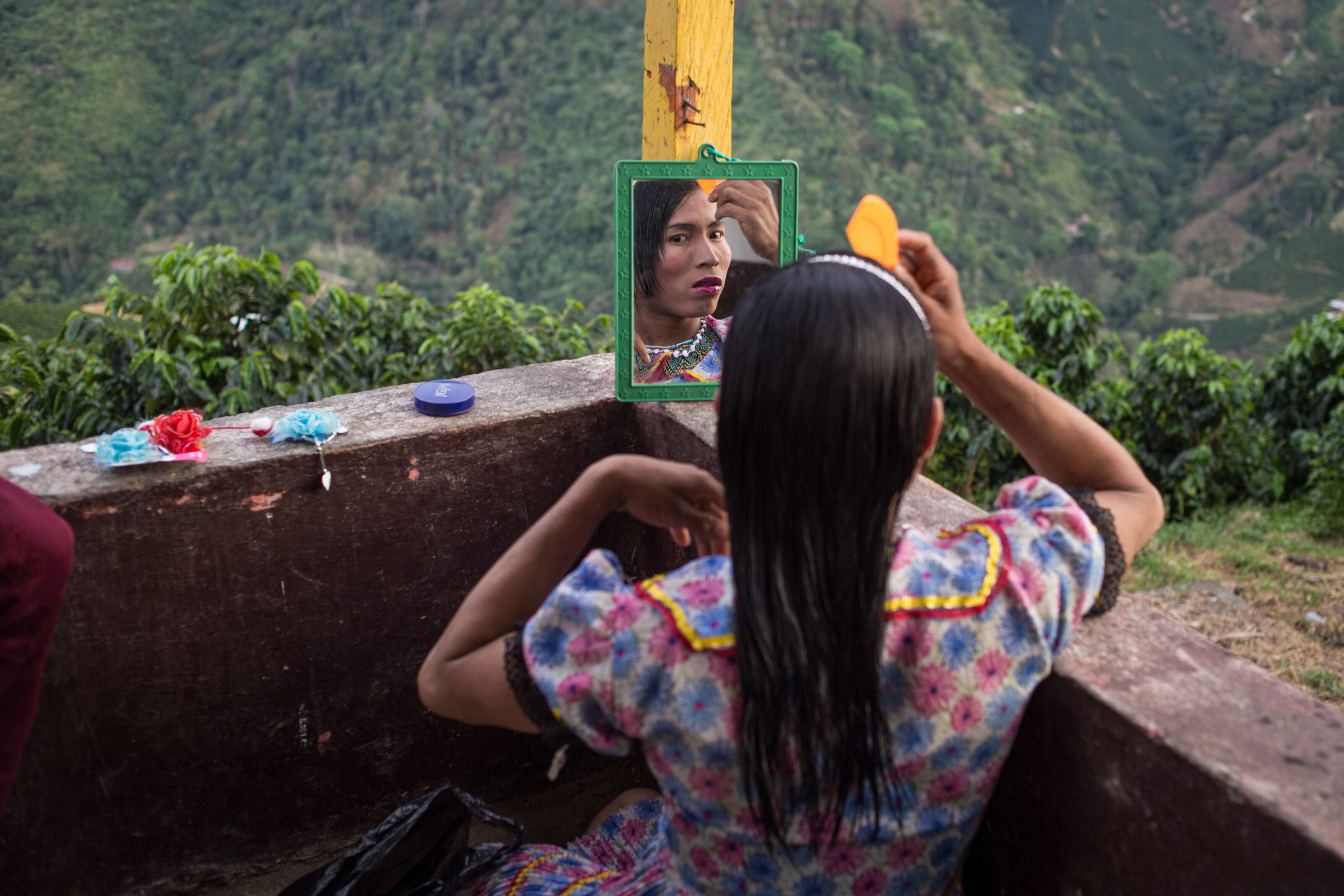Francy as she puts on her make up after a working day.